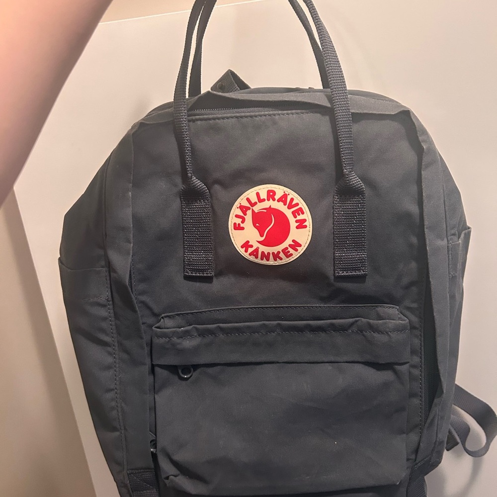 Fjallraven Kanken Backpack in Black with Red Logo Patch